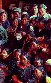 Tibetans Watching from the Shadows